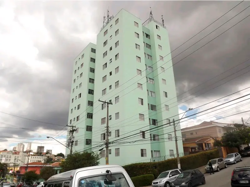 Serviço de pintura predial executado em fachada de edifício
